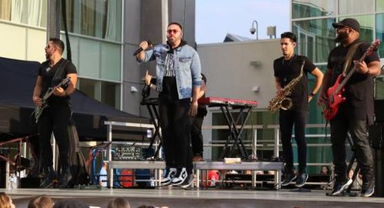 Danny Gokey gets airborne during his WGTS 91.9 Summer Concert Series Show.