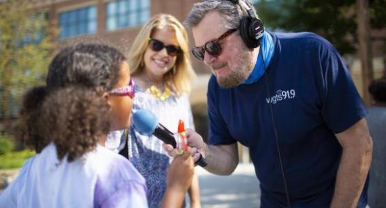 Johnny Stone, a WGTS 91.9 host, interviews listener Seraphina.