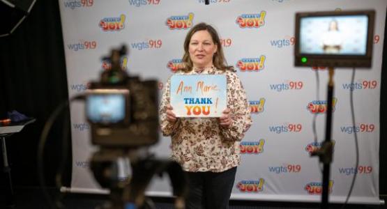 WGTS midday show host Becky Alignay records thank you videos for listeners who gave.