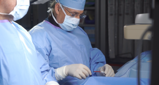 Fayaz Shawl, M.D., director of interventional cardiology at Adventist HealthCare Washington Adventist Hospital in Takoma Park, Md., performs the first MitraClip procedure at the hospital.
