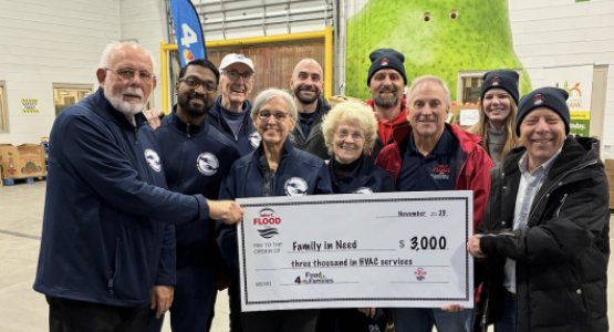 At the "Food 4 Families" event, the John C. Flood team grants ACSGW $3,000 to assist a family who was in need of HVAC services. At the "Food 4 Families" event, the John C. Flood team grants ACSGW $3,000 to assist a family who was in need of HVAC services.