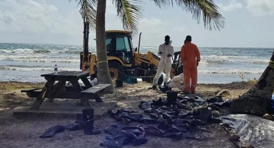 ADRA workers and volunteers help clean up fuel oil spills on Tobago’s beaches. Photo credit: ADRA Trinidad and Tobago ADRA workers and volunteers help clean up fuel oil spills on Tobago’s beaches. Photo credit: ADRA Trinidad and Tobago