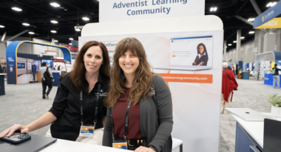 Paola Franco-Oudri, associate director of Adventist Learning Center and Heather More, project manager for Adventist Learning Community, greet people at the NAD portion of GC Session exhibit hall. Photo by Katie Fellows / Lake Union Herald Paola Franco-Oudri, associate director of Adventist Learning Center and Heather More, project manager for Adventist Learning Community, greet people at the NAD portion of GC Session exhibit hall. Photo by Katie Fellows / Lake Union Herald