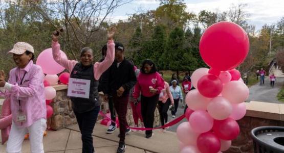 Doreen Palmer, a member of the Walnut Street church in Pottstown, Pa., crosses the finish line.