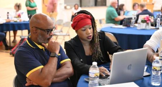 Two teachers collaborate at the 2024 Columbia Union Conference Principals' Bootcamp