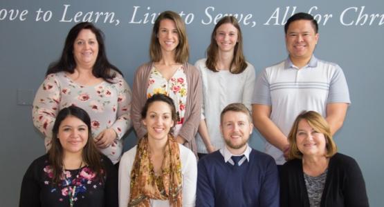 Alumni who currently serve at SAA are (back row, left to right) Terri Sheahin (1973–1984), elementary administrative assistant; Kaitlyn Masotta (’11), Spanish; Lisa Froelich (’10), band; Greg Macalinao (’05), P. E./health; (front row) Pamela Hernandez (’15), Pre-K aide; Brittany Thorp (’07), business manager; Jarrod Lutz (’07), English; and Linda McEowen (1957–1966), guidance counselor/P. E.