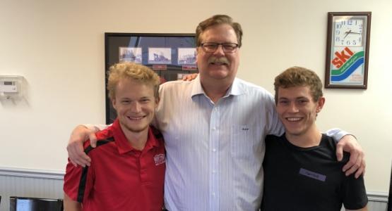 Ohio Conference President Ron Halvorsen Jr. visits Eric Anderson (left) and Amani Hrabowy, young adults who presented a Bible study program at a local pizza shop in Jackson.