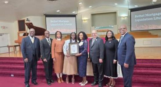 Pictured left to right: Ricky Martin, Bethel church senior pastor; Christ-Roi Cheres, head elder; Abdelle Cheres, member; Lisa Hood, elder of the Southeast church in Cleveland; Vivian Martin, member; Marvin C. Brown, III, Allegheny West Conference (AWC) president; Keisha Stubbs-Bone, AWC treasurer; and Joel Johnson, AWC executive vice president, cele- brate the church’s mortgage liquidation.