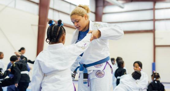 Photo of Kayla Dehm during a jiu-jitsu class session. by Brian Tagalog
