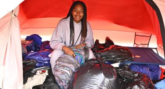 Prentice Park Pathfinder Braise Ellis packs up her tent.