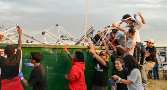 Chesapeake Conference's New Hope Nighthawks "dumpster toss" following the thunderstorm.