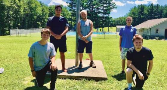 In 2020, counselors (back row) Charles Ames, Andrew Jones, Joshua Fahey, (front row) Mark Ames and Jed Williamson make a difference in the lives of campers. In 2020, counselors (back row) Charles Ames, Andrew Jones, Joshua Fahey, (front row) Mark Ames and Jed Williamson make a difference in the lives of campers.