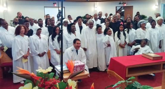 Candidates prepare to be baptized at the Glenville Present Truth church in Cleveland. 