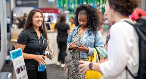 Cassie Mattheson, Kettering Health HR Workforce Development & International Talent Acquisition manager, shares health tips with General Conference Session visitors. Photo by Gerhard Weiner/AME (CC BY 4.0)