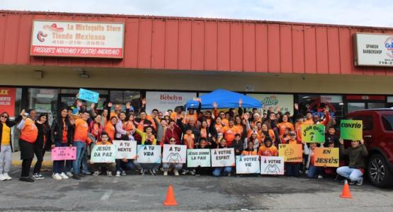 Church members greet patrons outside a Hispanic grocery store in Salisbury, Md. Salisbury Churches Partner for Outreach, Chesapeake Conference, El Amor Llegó, Salisbury Spanish, Salisbury City Redención, Chesapeake Haitian, Beacon of Light, Pentecost 2025