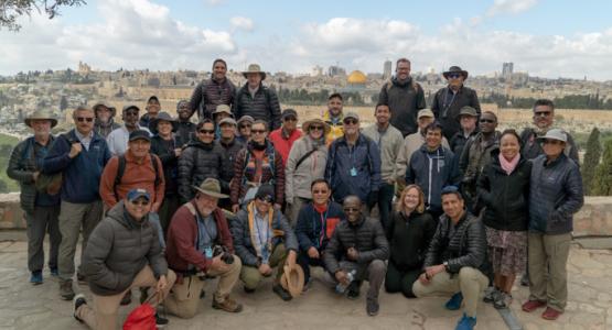 The educational study tour group takes a photo overlooking Jersualem. Chesapeake Conference, Jerry Lutz, Eli Rojas, Pastors Renew Faith on Bible Lands Trip