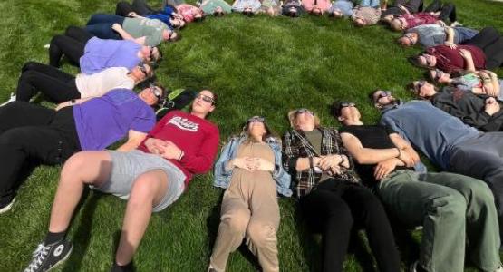 Students at Kettering College experience the 2024 eclipse.