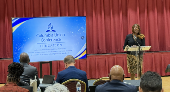 Cynthia Poole presents as part of the November 2025 Education report at the Executive Committee meeting.