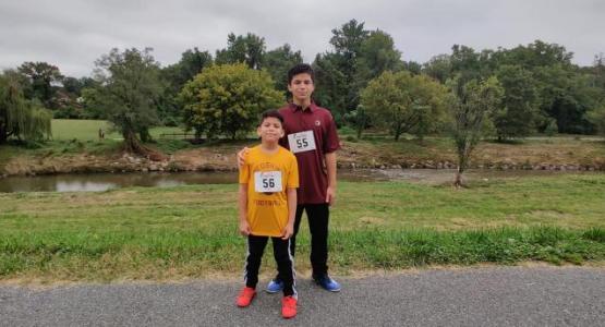 Derel and Douglas Reyes Jr. participate in the Virtual Visitor 5K/1 Mile Race/Walk