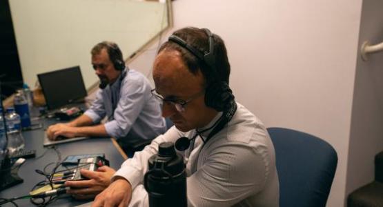 Chesapeake Conference pastor Diego Boquer is one of the translators at the GC Session. Image by Pieter Damsteegt/ NAD