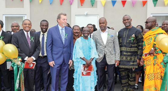 Columbia Union Conference officials, Seth Bardu, treasurer; Emmanuel Asiedu, secretary/treasurer for the Columbia Union Revolving Fund; and Dave Weigley, president, join Amofah Asamoah, pastor of Ebenezer Ghana; Ras J. Baraka, mayor of Newark, N.J.; and other dignitaries and guests, to celebrate the grand opening of the new church building.