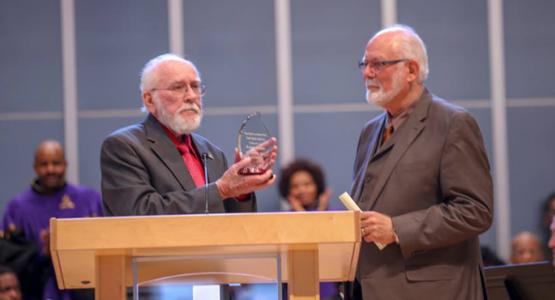 Erwin Mack present the Caring Heart Award to Ken Flemmer