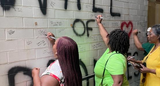 Church and community members write prayers for the building project on the church’s prayer wall. Grace Community church, Allegheny West Conference