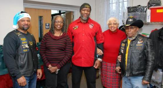 Fourth Street Friendship members with with Buffalo soldiers volunteers at an event for those experiencing homelessness