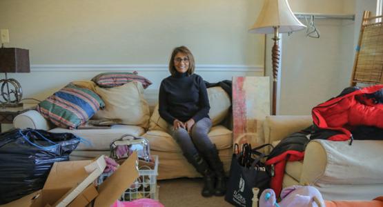 Hannah Koilpillai, an immigrant to the U.S., helps decorate and prepare new homes for refugees in the Washington, D.C., area. Photograph by Ross Patterson