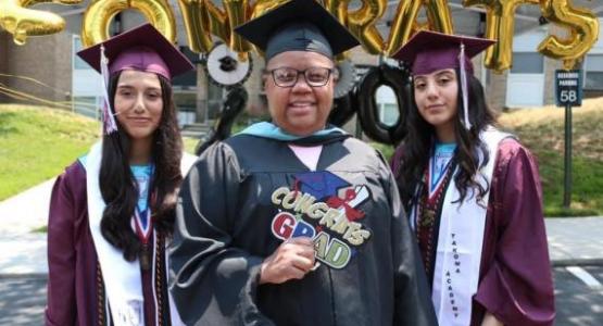 Maria and Reina Cordona are pictured with principal Carla Thrower