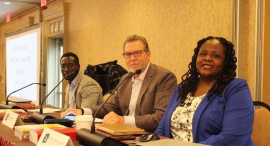 Emmanuel Asideu, Dave Weigley and Celeste Ryan prepare to start the the Columbia Union Conference Executive Committee meeting.