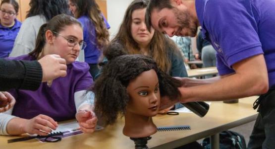 At a recent culture lab, Occupational Therapy students at Kettering College get hands-on experience with serving clients with diverse hair textures to ensure comfort and confidence when they step into their careers.