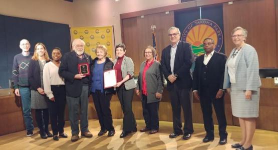 Erwin and Sylvia Mack are joined by the Takoma Park City Council