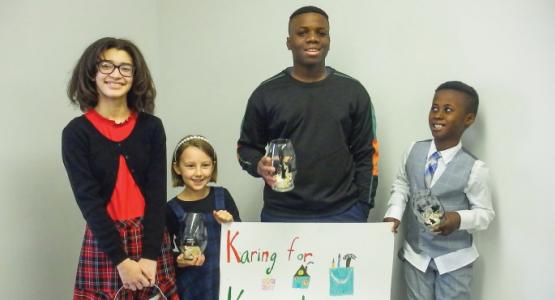 Peyton Marhall-Lett, Anika Wendth, Emmanuel Henneh and Charles Boampong are part of the Hamilton church Sabbath School that raised $1,800 for storm relief Ohio Conference, Hamilton Church, Karing for Kentucky, Kare for Kentucky
