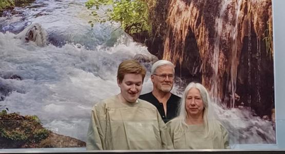 Dan Beavers, a lay pastor at the Romney church, baptizes mother and son, Tyra and Hunter Worthy, following a three-week evangelistic series. God Moves in Romney Church, Mountain View Conference, Romney church, Eddie Reyes, Michael Carder, Amazing Facts