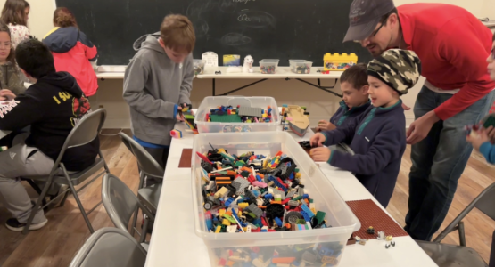 Participants bond while building LEGO creations. Participants bond while building LEGO creations.