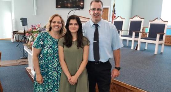 Lauri and Joe Nichols came to know Christ as a result of Rachel Velez (center), a 14-year-old who couldn't hide her love for Jesus.