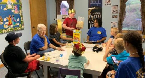 VBS leaders (in blue) teach about the character traits—truth and trusting—that Daniel and his friends relied on in Babylon. VBS leaders (in blue) teach about the character traits—truth and trusting—that Daniel and his friends relied on in Babylon.