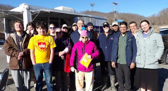 Volunteers unite to help flood victims in Williamson. Conference Serves Flooded Community, Mountain View Conference, Tony Garcia, Williamson church, Tug Fork River