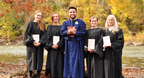 Proudly displaying their baptismal certificates, the Nonnemacher family members Tyler, Layne, Carsyn and Sharyce flank Eddie Reyes, pastor of the Rainelle church. Proudly displaying their baptismal certificates, the Nonnemacher family members Tyler, Layne, Carsyn and Sharyce flank Eddie Reyes, pastor of the Rainelle church.