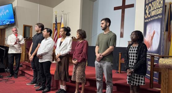 Led by Rafael Monteiro (far left), volunteer lay pastor, Omer Akyuz (second from the right) stands alongside other First Filipino church baptismal candidates who publicly show their love for Christ. From a Small Group to a New Life, New Jersey Conference, First Filipino church, E. Jardiniano, Rafael Monteiro