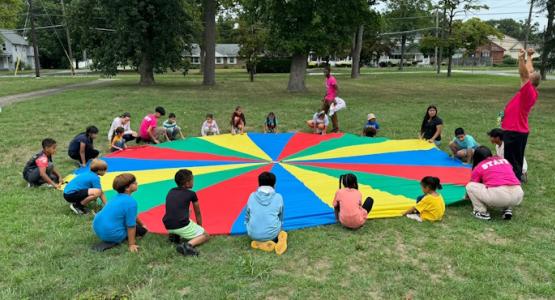 FLAG Camp children and staff have fun during a hands-on activity. Conference Offers Two Summer Camp Options, New Jersey Conference, LEGIT (Love, Encourage, Give, Inspire, Teach), FLAG (Fun Learning About God), Carl Rodriguez