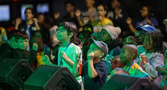 Children listen intently to the story of Esther as the drama team presents the story. Kids Have ‘Courage 2 Stand’ at Adventuree, New Jersey Conference, Hamantaschen cookies, Esther, Mordecai, Tranquility Camp