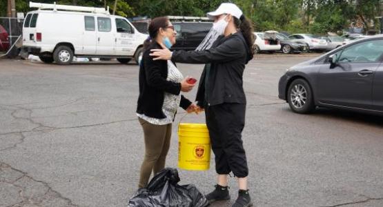 A New Jersey Conference volunteer greets one of the Hurrican Ida survivors. A New Jersey Conference volunteer greets one of the Hurrican Ida survivors.