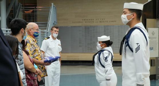 The Navy Honor Guard presents the U.S. flag to Robert Littlejohn Jr. (holding the flag), son of Robert Littlejohn Sr., a departed Navy World War II veteran. Veterans Day, Robert Littlejohn, Jr., Robert Littlejohn, Sr.