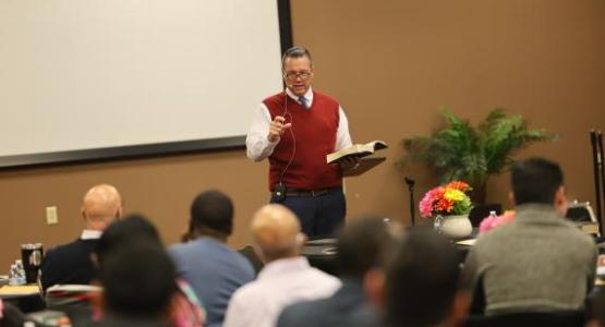 Bob Cundiff, Ohio Conference president, opens the two-day meeting with a devotional, affirming the sacred calling of pastoral ministry.