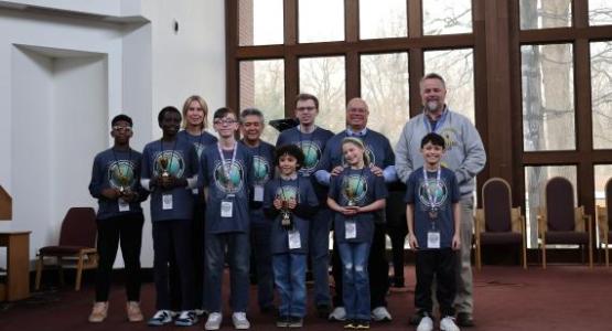Geography Challenge winners proudly stand with Ohio Conference staff members. Geography Challenge winners proudly stand with Ohio Conference staff members.