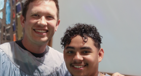 João Marques, alongside Blue Mountain Academy Pastor Adam Bially, celebrate his baptism together.