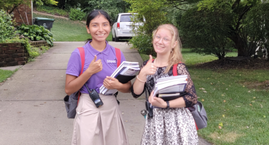 Two students share God’s love in Pennsylvania by canvassing a neighborhood. Two students share God’s love in Pennsylvania by canvassing a neighborhood.