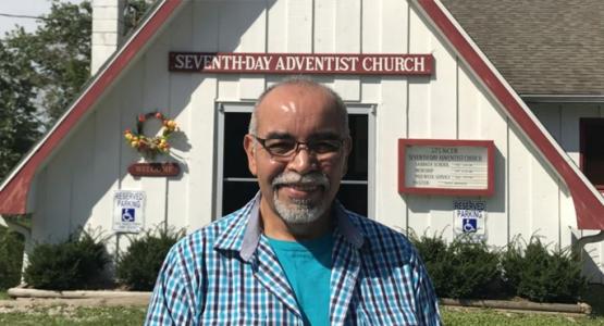 John Peña, 57, standing outside the Seventh-day Adventist church in Spencer, West Virginia. The church is among 35 that received Thirteenth Sabbath funds to organize evangelistic meetings in 2015. (Andrew McChesney / Adventist Mission)